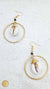 Boucles d’oreilles en laiton et cauri – Fait main au Kenya