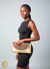 Pochette africaine Dhahabu en perles dorées et cuir